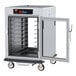 A Metro C5 heated holding and proofing cabinet with clear doors.