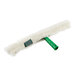 A white fluffy mop with a green plastic T-bar handle.