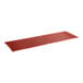 A red rectangular rubber floor mat with beveled edges.