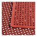 A red rubber Choice anti-fatigue floor mat with holes.