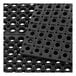 A close up of a black Lavex anti-fatigue floor mat with holes.