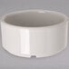 A white Carlisle straight sided ramekin on a gray background.