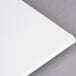 An American Metalcraft white flat melamine platter on a white surface.