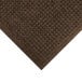 A dark brown WaterHog mat with a square patterned border.