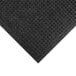 A close up of a black M+A Matting WaterHog mat with a square patterned border.