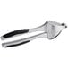 A close up of a Choice 7" chrome and black plastic garlic press.
