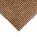 A close-up of a brown WaterHog mat with a square pattern.