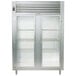 A Traulsen stainless steel two section glass door reach-in refrigerator.
