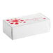 A white Valentine's Day candy box with red hearts on it.