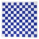 A white surface with a blue square and white checkered pattern.