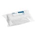 A white plastic bag of Lavex white multi-purpose scouring pads.