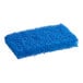 A close-up of a Lavex blue scouring pad.