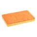 A Lavex sponge with an orange medium-duty scouring pad.