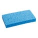 A Lavex blue cellulose sponge on a counter.