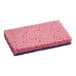 A Lavex pink cellulose sponge with purple scouring pad spots.