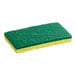 A green Lavex heavy-duty scouring pad with a yellow sponge on top.