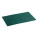 A dark green rectangular scouring pad.