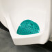 A urinal with a green circle in it.
