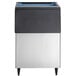 A white rectangular Hoshizaki ice storage bin with a stainless steel lid.