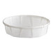A small, white, round paper souffle or portion cup.
