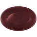 A red oval polyethylene basket with a raspberry oval weave pattern.