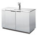 A stainless steel Beverage-Air kegerator on a counter with taps.