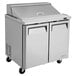 A large stainless steel Turbo Air refrigerated sandwich prep table with two doors.