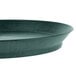 A green polypropylene oval deli server with a short black base.