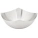 A close-up of an American Metalcraft satin stainless steel bowl with a curved edge.