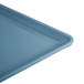 A close-up of a teal Cambro dietary tray.