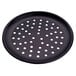 A black pan with holes in it.