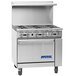 A stainless steel Imperial Range commercial gas range with 4 burners and a griddle over a cabinet.