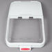 A clear plastic sliding lid with a scoop hook.