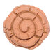 A cookie stamped with a spiral design using an Ateco spiral bread stamp.
