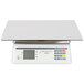 A Cardinal Detecto RP30S rectangular white electronic scale on a counter.