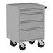 A grey metal Valley Craft workbench with four drawers.