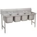 A stainless steel Advance Tabco four compartment pot sink.