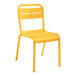 A yellow resin Grosfillex outdoor sidechair.