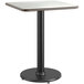 A Lancaster Table & Seating square table with a white surface and black base.