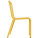 A yellow plastic Grosfillex Cannes outdoor sidechair.