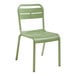 A sage green Grosfillex plastic outdoor sidechair.