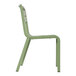 A sage green resin Grosfillex outdoor sidechair with a white seat and back.