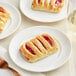 A white plate with a Bridor Ready to Bake Mini Raspberry Danish on it.