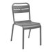 A grey plastic Grosfillex Cannes outdoor sidechair with a back.