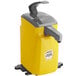 A yellow and grey Heinz Keystone countertop mustard pump dispenser with a handle.