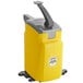 A yellow and grey Heinz Keystone countertop mustard pump dispenser container.