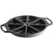 A Lodge black cast iron wedge pan with 8 slots.