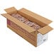 A cardboard box with Sweet Sam's Cinnamon Walnut Pound Cake slices inside.