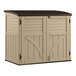 A tan outdoor storage shed with brown trim.