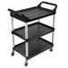 A black Rubbermaid three shelf utility cart with wheels.